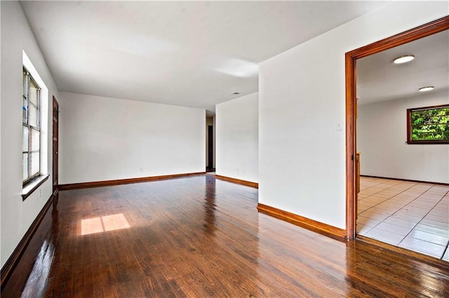 754 Pinemont Dr, Mobile, AL 36609 - empty room with wood finished floors and baseboards