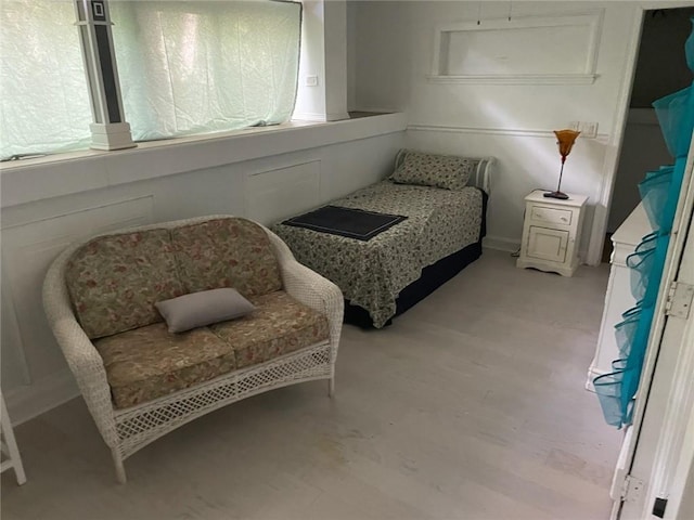 bedroom featuring light wood-style floors