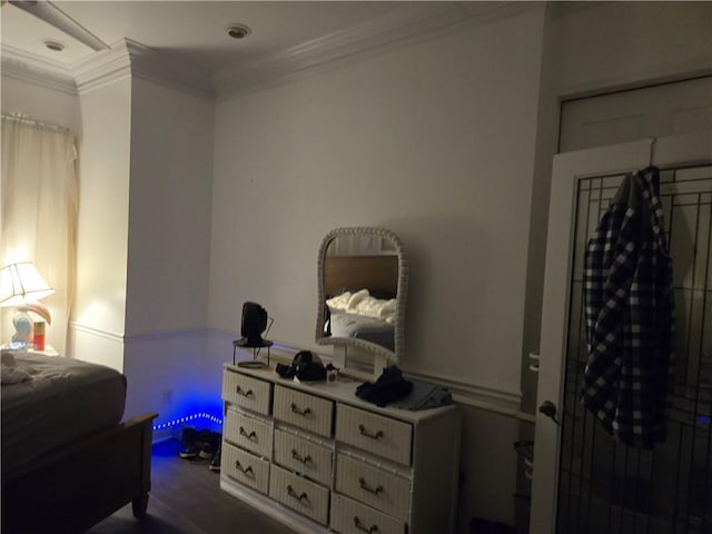 bedroom featuring crown molding