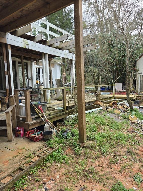 view of yard with a wooden deck