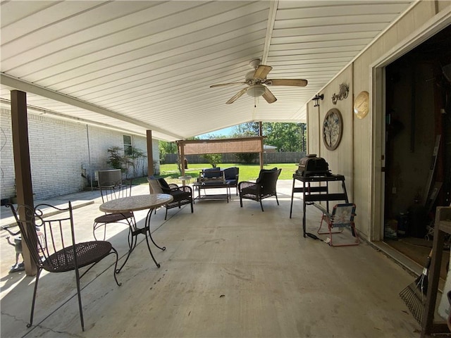 view of patio with a fenced backyard, ceiling fan, and an outdoor living space