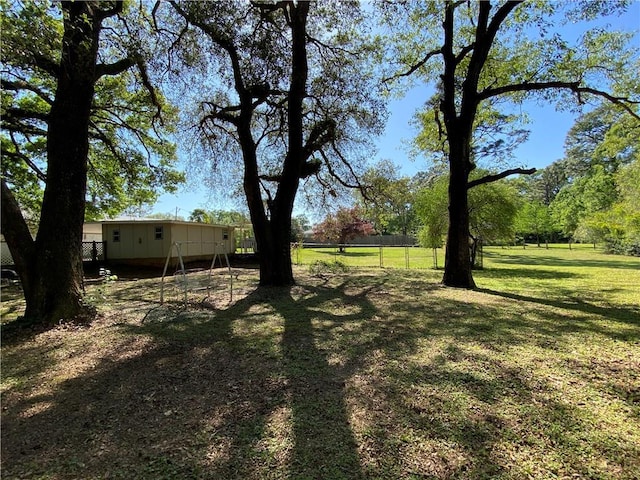 view of yard with fence