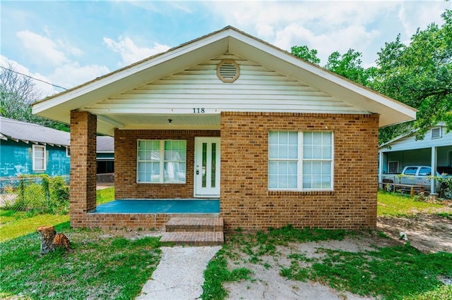 bungalow-style home with a porch