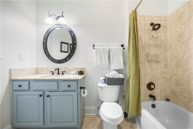 1449 Lagoon Dr W Unit B, Gulf Shores, AL 36542 - bathroom featuring vanity, toilet, shower / bath combination with curtain, baseboards, and tile patterned flooring
