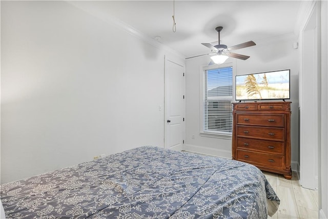 1449 Lagoon Dr W Unit B, Gulf Shores, AL 36542 - bedroom featuring crown molding and a ceiling fan