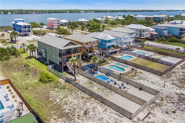 1449 Lagoon Dr W Unit B, Gulf Shores, AL 36542 - bird's eye view of a pool and a nearby body of water