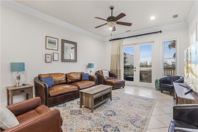 1449 Lagoon Dr W Unit B, Gulf Shores, AL 36542 - living area with light tile patterned floors, ornamental molding, ceiling fan, french doors, and recessed lighting