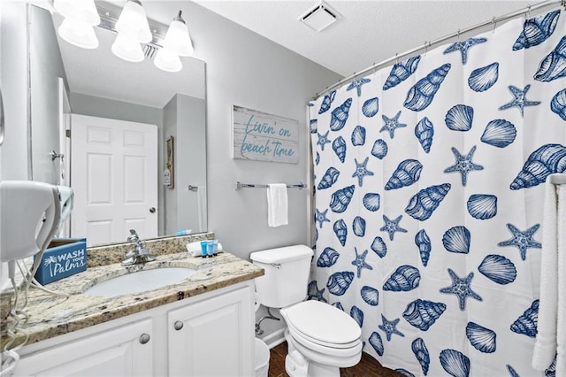 527 Beach Club Trl Unit D1103, Gulf Shores, AL 36542 - full bathroom with vanity, curtained shower, and a textured ceiling