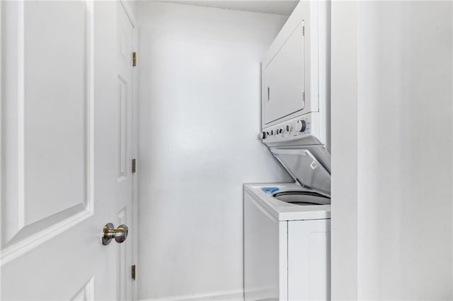 527 Beach Club Trl Unit D1103, Gulf Shores, AL 36542 - washroom with stacked washer / dryer
