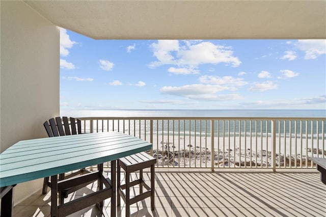 527 Beach Club Trl Unit D1103, Gulf Shores, AL 36542 - balcony with view of water and beach and outdoor dining area