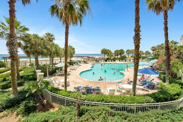 527 Beach Club Trl Unit D1103, Gulf Shores, AL 36542 - community pool featuring a patio and a water view