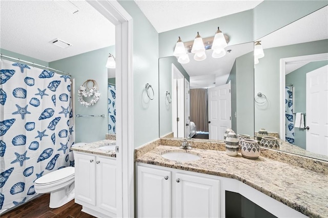 527 Beach Club Trl Unit D1103, Gulf Shores, AL 36542 - full bath with wood finished floors, two vanities, and a shower with shower curtain