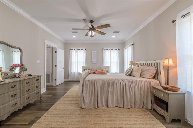 bedroom with ceiling fan, crown molding, and dark hardwood / wood-style floors