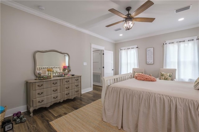 bedroom with dark hardwood / wood-style floors, ceiling fan, and crown molding