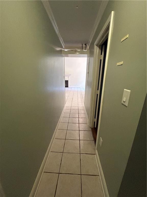 9016 Julie St, Mobile, AL 36608 - corridor featuring light tile patterned flooring, crown molding, and baseboards