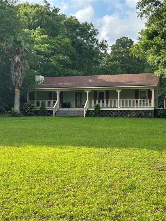 9016 Julie St, Mobile, AL 36608 - view of front of home featuring covered porch and a front yard