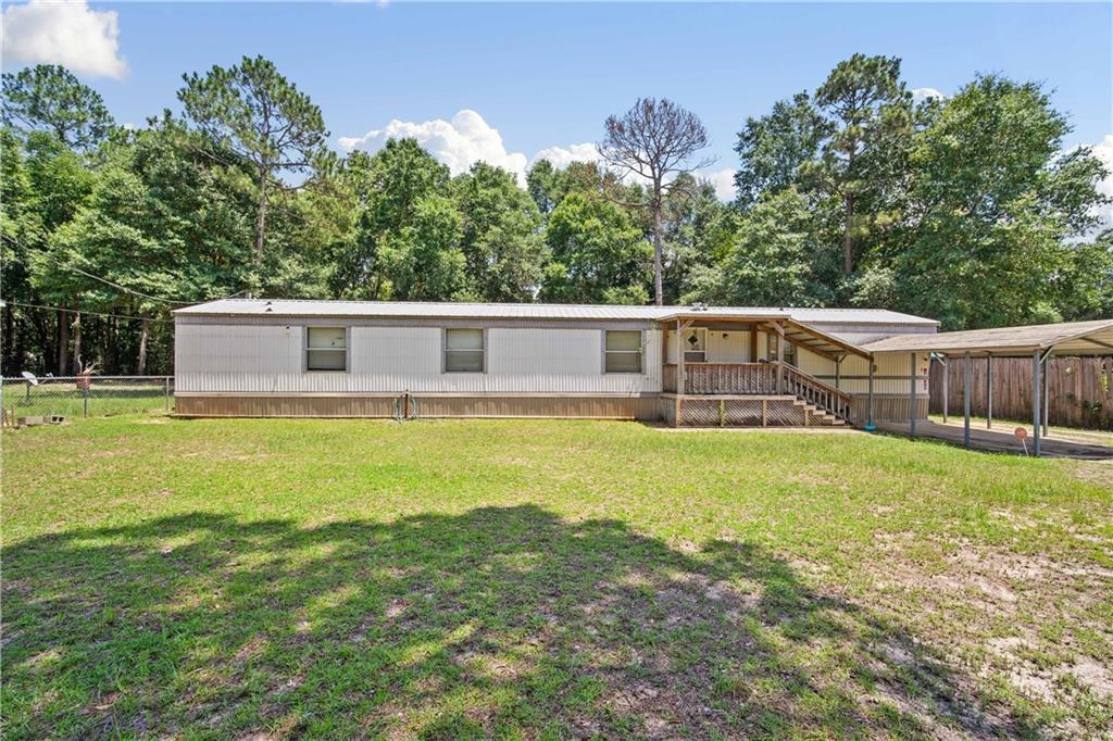 5050 Gaynor Rd, Eight Mile, AL 36613 - view of front of home featuring a carport