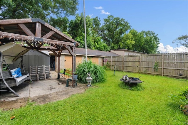 view of yard featuring a gazebo and a patio