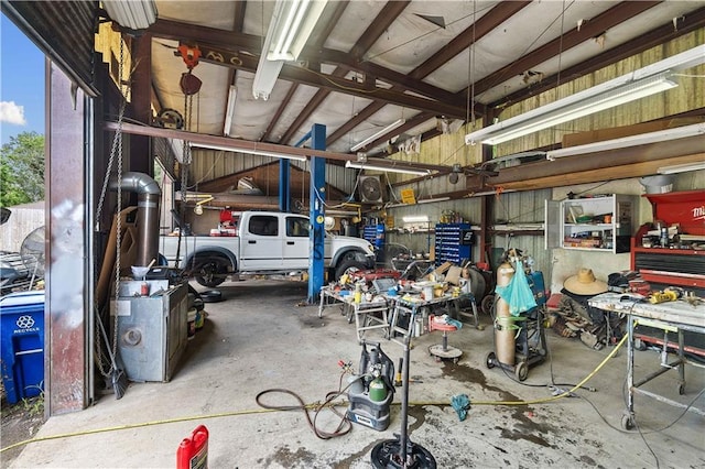 garage with a workshop area