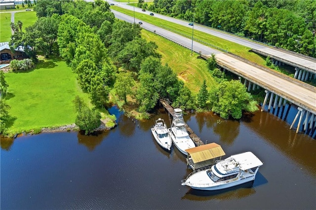 bird's eye view with a water view