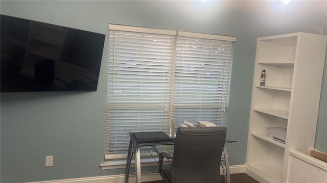 office featuring wood finished floors and baseboards