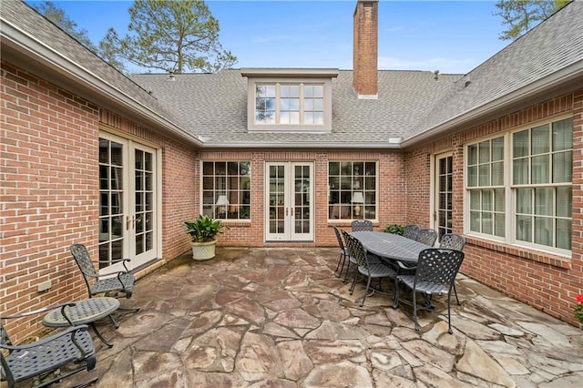 view of patio / terrace featuring french doors and outdoor dining area