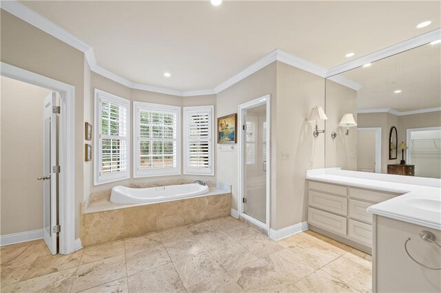 full bathroom with a stall shower, baseboards, ornamental molding, vanity, and a bath