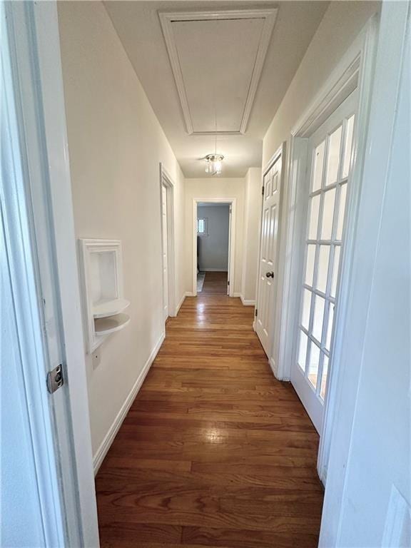 corridor with dark wood-type flooring