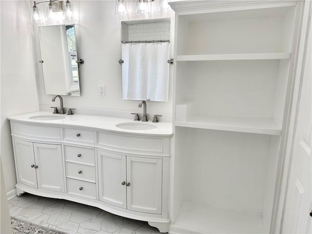 bathroom with vanity and walk in shower