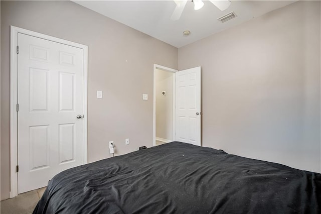 carpeted bedroom featuring ceiling fan