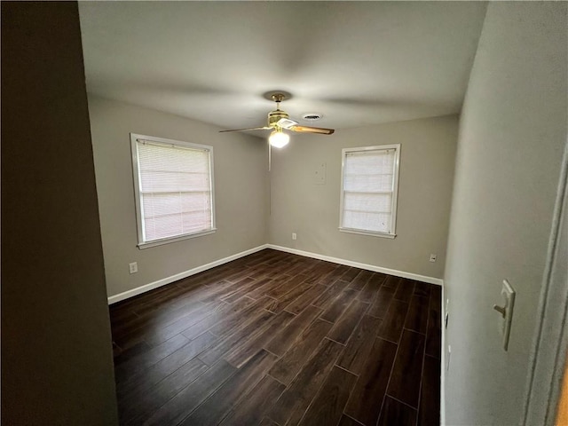 5855 Zeigler Blvd, Mobile, AL 36608 - empty room featuring baseboards, ceiling fan, and dark wood-style flooring