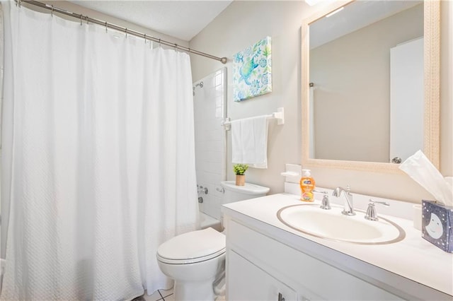 bathroom with toilet, shower / bath combo with shower curtain, and vanity