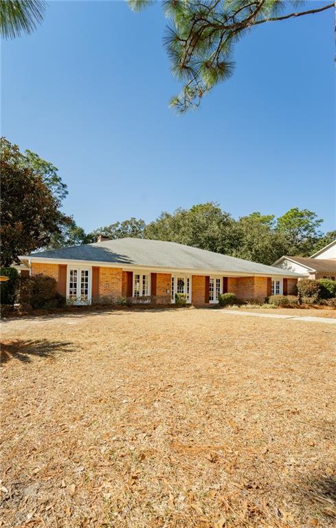 ranch-style house with french doors