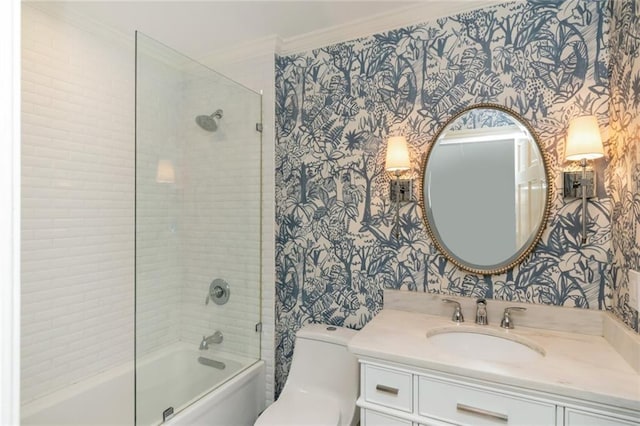6000 Shenandoah Rd N, Mobile, AL 36608 - full bathroom with wallpapered walls, ornamental molding, toilet, bathtub / shower combination, and vanity