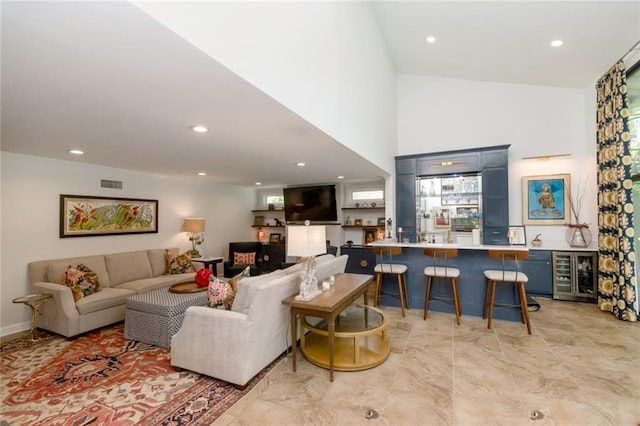 6000 Shenandoah Rd N, Mobile, AL 36608 - living area featuring beverage cooler, recessed lighting, and light marble finish floors