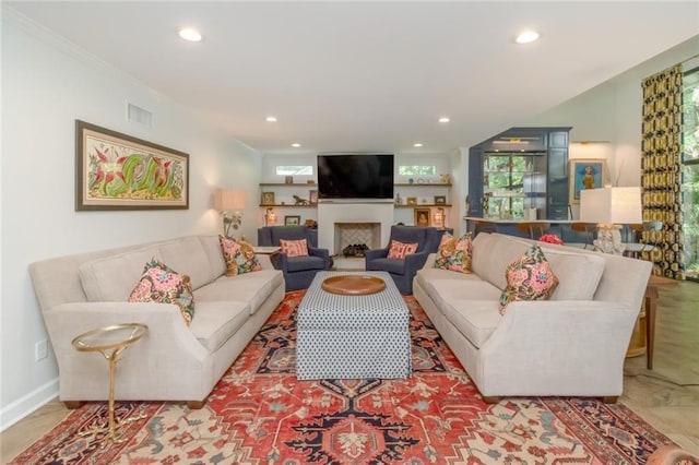 6000 Shenandoah Rd N, Mobile, AL 36608 - living room with healthy amount of natural light, recessed lighting, a fireplace, and baseboards