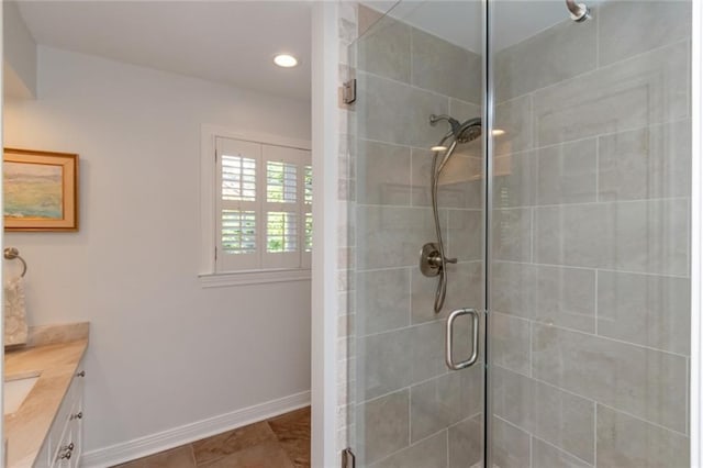 6000 Shenandoah Rd N, Mobile, AL 36608 - full bath featuring a stall shower, vanity, baseboards, and recessed lighting