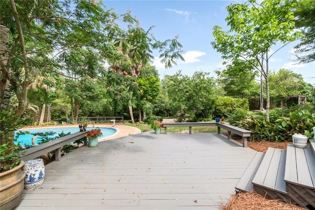 6000 Shenandoah Rd N, Mobile, AL 36608 - deck with an outdoor pool and view of scattered trees