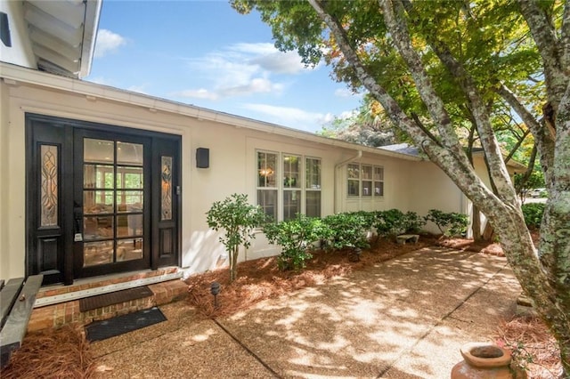 6000 Shenandoah Rd N, Mobile, AL 36608 - doorway to property with stucco siding