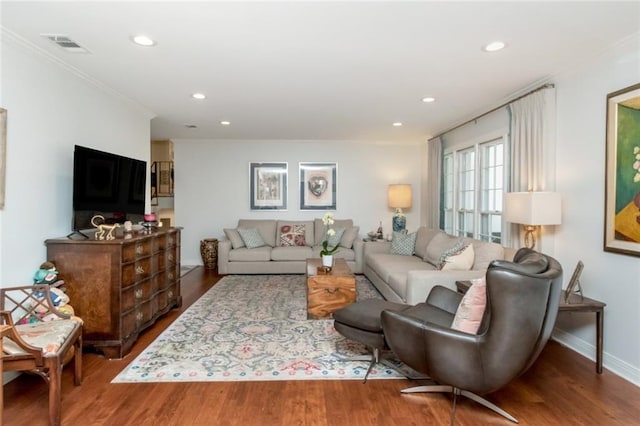 6000 Shenandoah Rd N, Mobile, AL 36608 - living room featuring ornamental molding, wood finished floors, recessed lighting, and baseboards