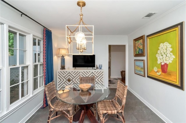 6000 Shenandoah Rd N, Mobile, AL 36608 - dining room featuring a chandelier, baseboards, crown molding, and tile patterned flooring