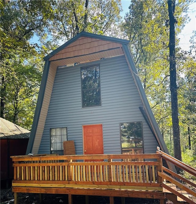 rear view of house with a deck