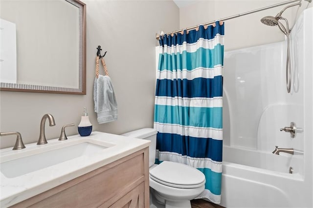 full bathroom with toilet, shower / bathtub combination with curtain, and vanity