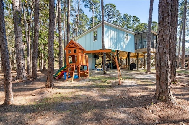 view of play area with a sunroom