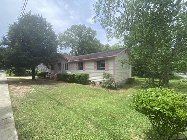 351 Lincoln Blvd, Mobile, AL 36608 - view of side of home with a lawn