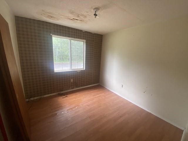 351 Lincoln Blvd, Mobile, AL 36608 - unfurnished room with wood finished floors and baseboards