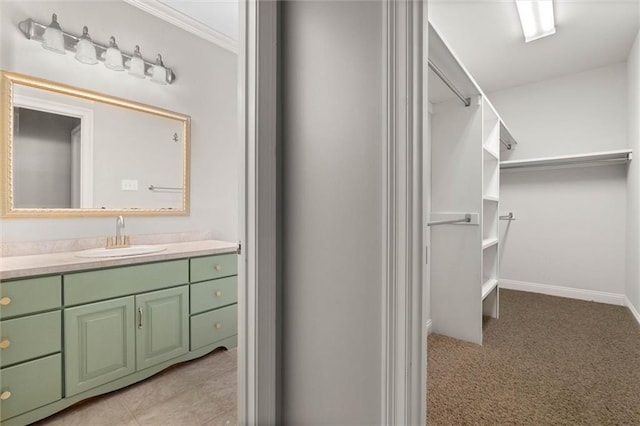 6060 Riverchase Dr S, Mobile, AL 36619 - walk in closet featuring a sink and light carpet