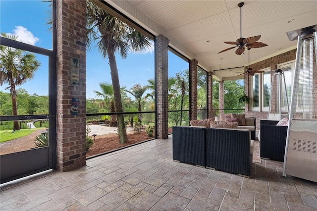 6060 Riverchase Dr S, Mobile, AL 36619 - unfurnished sunroom with ceiling fan and an outdoor living space