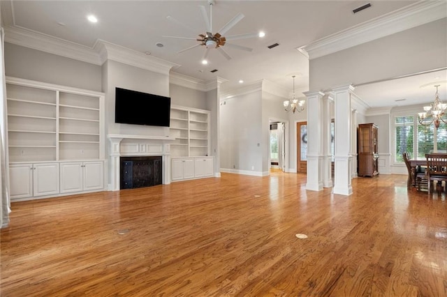 6060 Riverchase Dr S, Mobile, AL 36619 - unfurnished living room with a chandelier, a fireplace, ornamental molding, a ceiling fan, and built in shelves