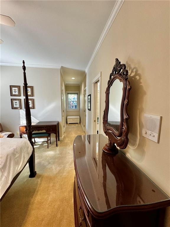 carpeted bedroom with crown molding